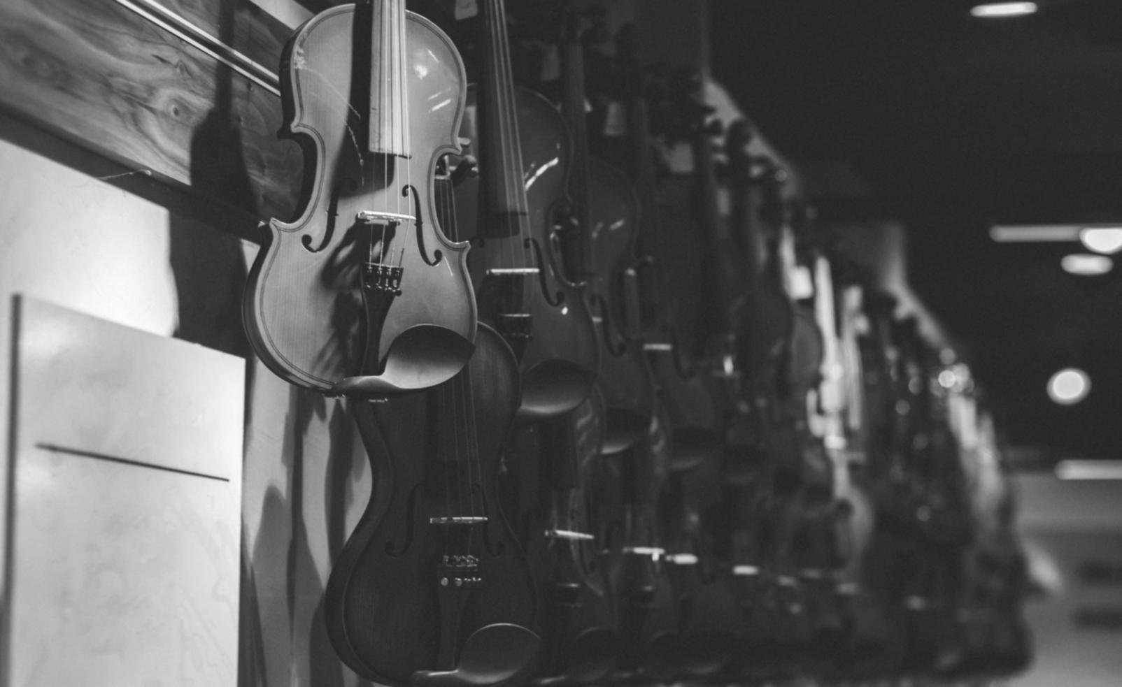 Student practicing music improvisation techniques at an instrument